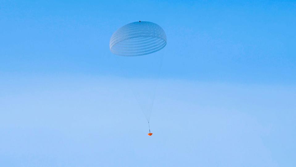 A prototype for a giant 115-foot (35 meters) parachute for the European Space Agency's ExoMars rover has passed its first drop test from a helicopter. <cite>I.Barel/ESA</cite>