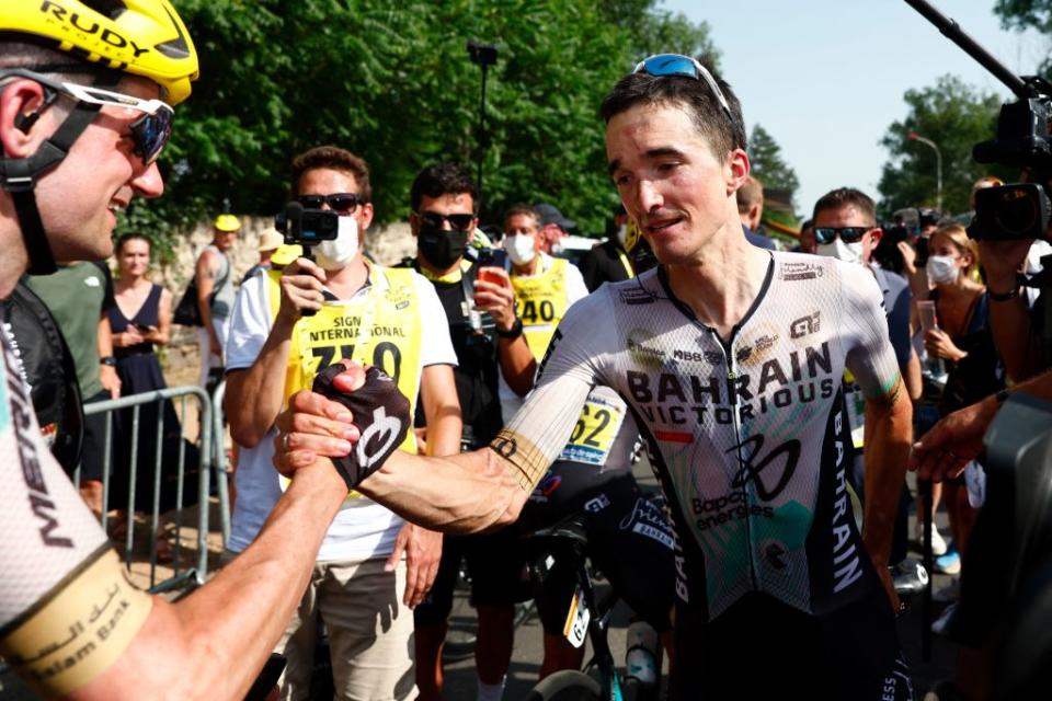 Bahrain  Victorious Spanish rider Pello Bilbao R celebrates after winning the 10th stage of the 110th edition of the Tour de France cycling race 1675 km between Vulcania and Issoire in the Massif Central highlands in central France on July 11 2023 Photo by GONZALO FUENTES  POOL  AFP Photo by GONZALO FUENTESPOOLAFP via Getty Images