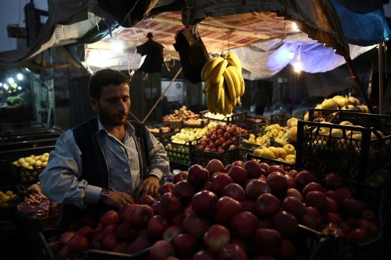 Traders in Azaz say it's cheaper for shoppers in rebel territory to buy Turkish-imported goods than products from government-held zones in Syria