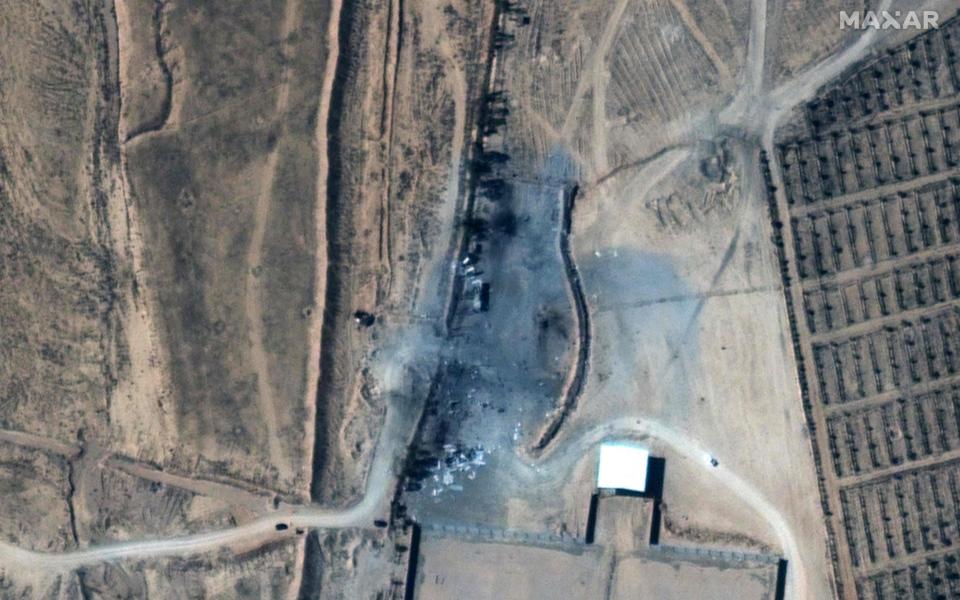 The aftermath of recent US airstrikes on a small group of buildings at an unofficial crossing at the Syria-Iraq border near Alm-Qaim, Iraq. - AFP