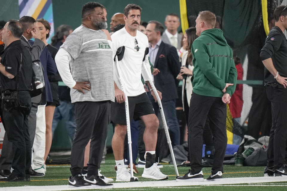 New York Jets quarterback Aaron Rodgers stands on the sidelines before an NFL football game against the Kansas City Chiefs on Sunday Oct. 1, 2023, in East Rutherford, NJ. (AP Photo/Bryan Woolston)