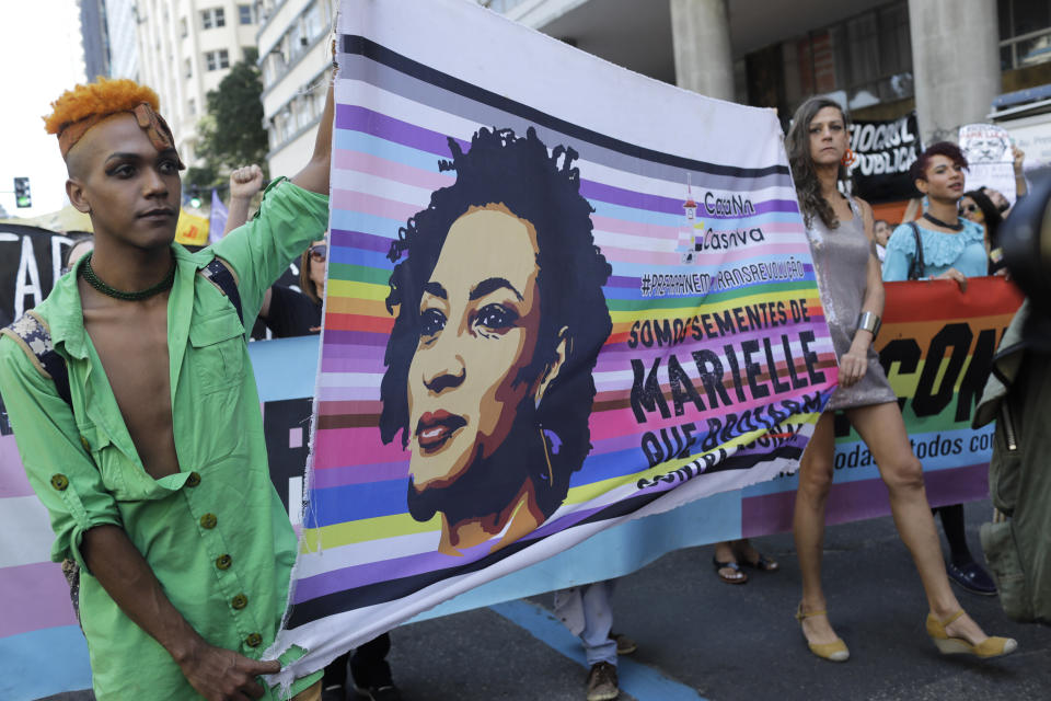 Protesters carry the image of slain councilwoman Marielle Franco in Rio de Janeiro on Sept. 7, 2019.&nbsp; (Photo: AP Photo/Silvia Izquierdo)