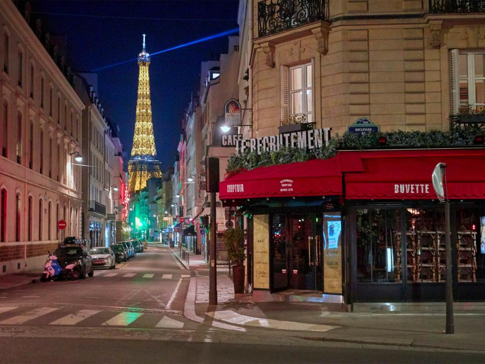 Closed bars and cafes pictured on empty streets on the first night of the Coronavirus curfew on October 17, 2020 in ParisGetty Images