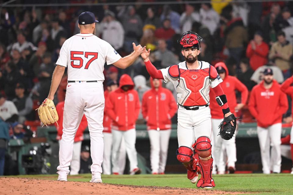 Red Sox pitcher Greg Weissert and catcher Connor Wong celebrate the win over the San Francisco Giants at Fenway Park on Wednesday.