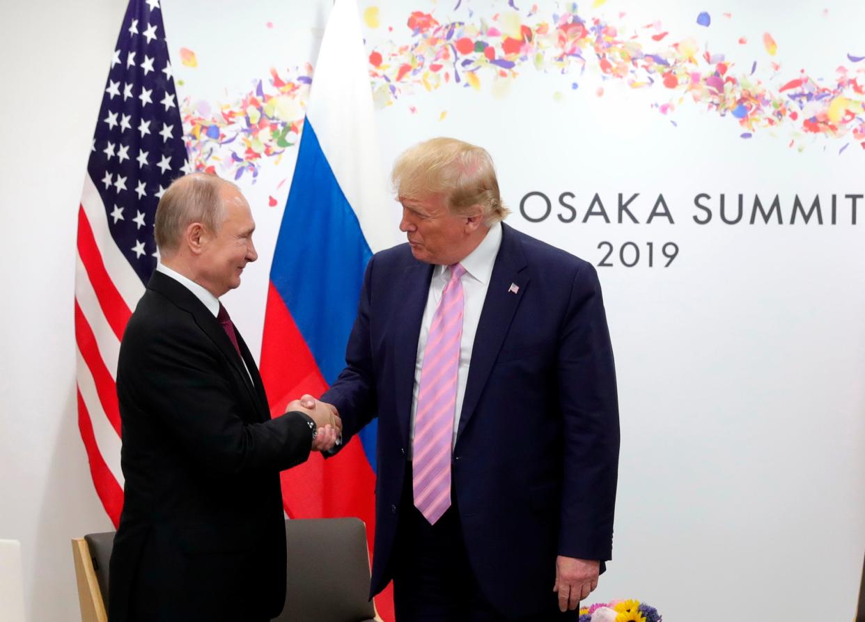 Presidents Donald Trump and Vladimir Putin attend a summit in Osaka, Japan, in 2019.