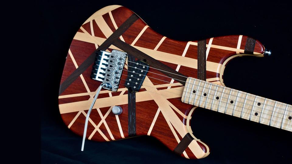 An Eddie Van Halen solid wood striped tribute guitar