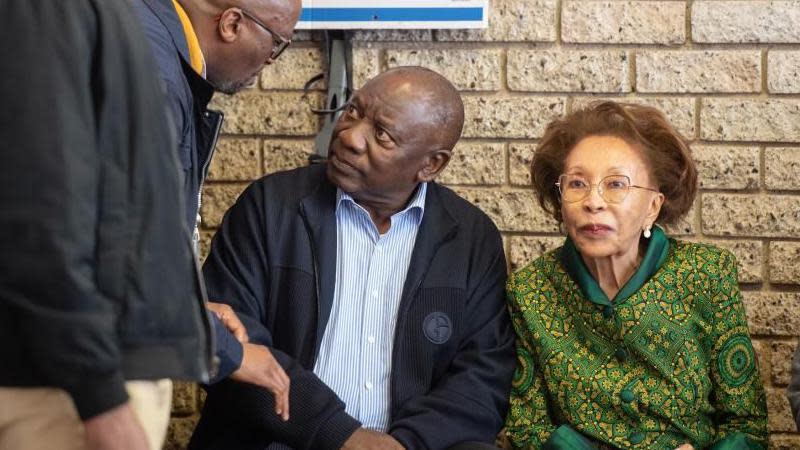 South African President Cyril Ramaphosa (C) sits as he prepares to cast his vote at Hitekani Primary School in Soweto township, South Africa, May 29, 2024