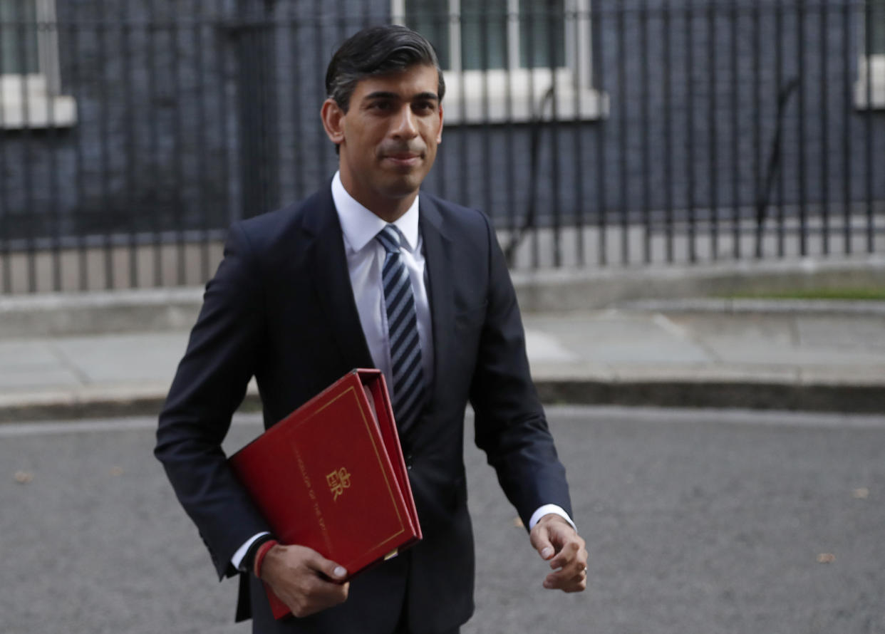 Chancellor of the Exchequer Rishi Sunak walks across Downing Street to a cabinet meeting in London, Tuesday, Sept. 15, 2020.(AP Photo/Frank Augstein)