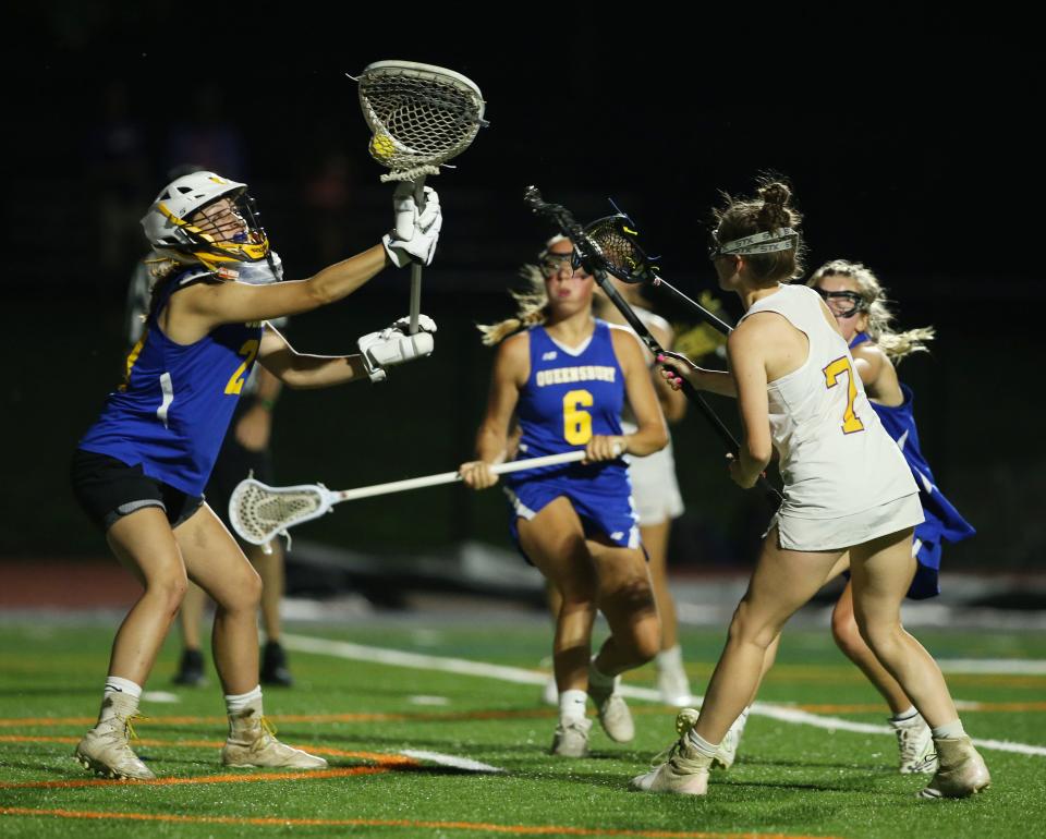 Warwick's Jillian Ziegler's shot is saved by Queensbury goalie Lindsay Bauer during Tuesday's Class B sub-regional game on May 31, 2022.