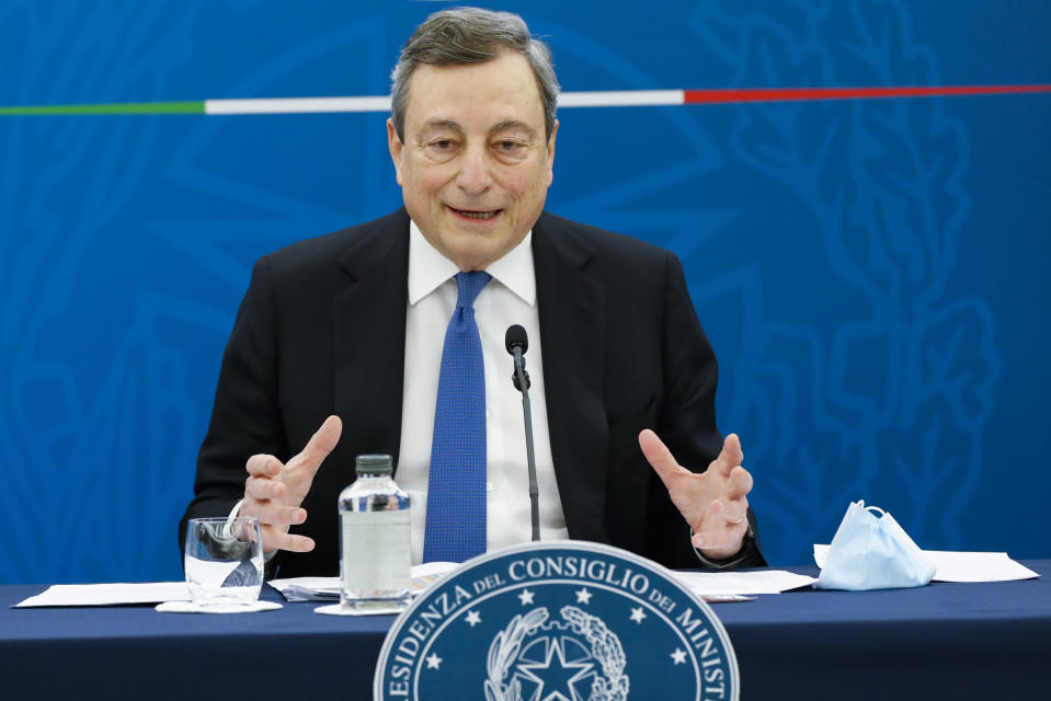 Italian Premier Mario Draghi meets the media during a news conference to illustrate the government's new measures to cope with COVID-19 pandemic, in Rome, Friday, April 16, 2021. (Remo Casilli/Pool via AP)