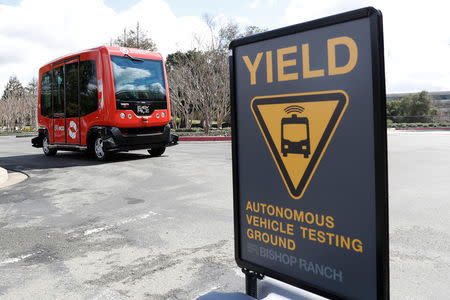 An EasyMile EZ10 shared autonomous vehicle carries passengers on a road at the Bishop Ranch business park during a deployment demonstration in San Ramon, California March 6, 2017. REUTERS/Stephen Lam