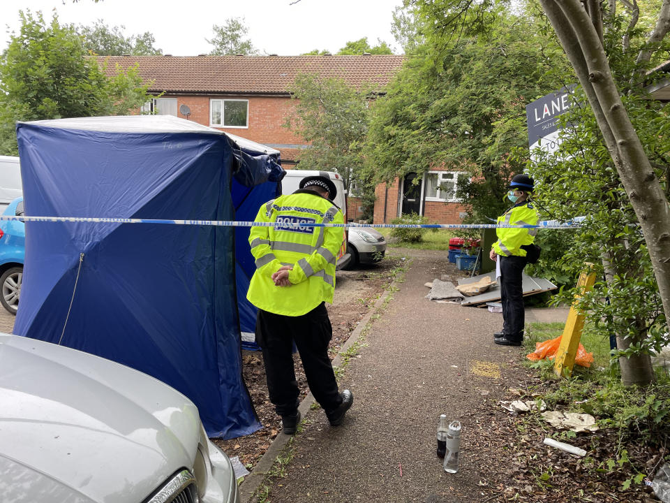 Police at the scene in Denmead, Two Mile Ash, in Milton Keynes, where a man has died after police fired gun shots at a property and where a second man was found dead and a young child seriously injured. Thames Valley Police (TVP) said in a statement officers were called to an address in Denmead, Two Mile Ash, at about 9.40am on Saturday and made a forced entry after acting on information from a witness. Picture date: Sunday June 27, 2021.