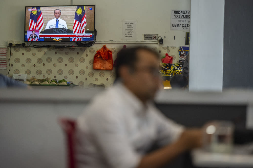 The live telecast of Prime Minister Tan Sri Muhyiddin Yassin speech about the movement control order in Kajang January 11, 2020. — Picture by Shafwan Zaidon