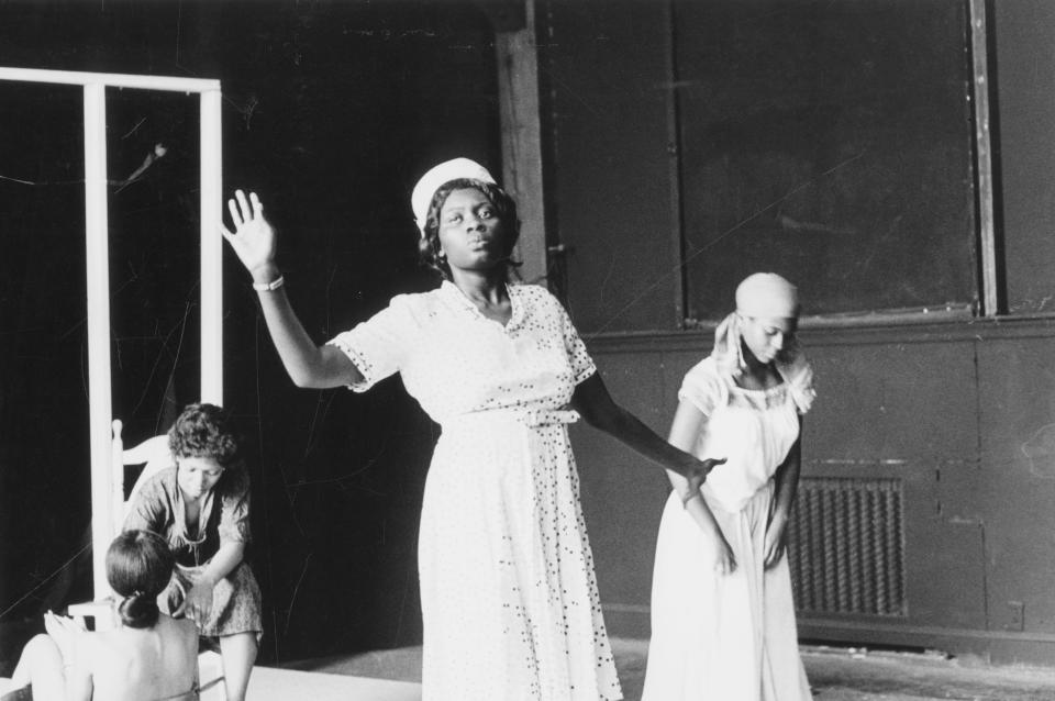 Margaret Holloway, center, performs on stage in the drama production "Recipe," in this June 1974 photo provided by Bennington College in Bennington VT. Holloway, who died of the coronavirus in May, was remembered by friends in New Haven as a gifted actor and director whose career was derailed by drugs and mental illness. (Bennington College via AP)