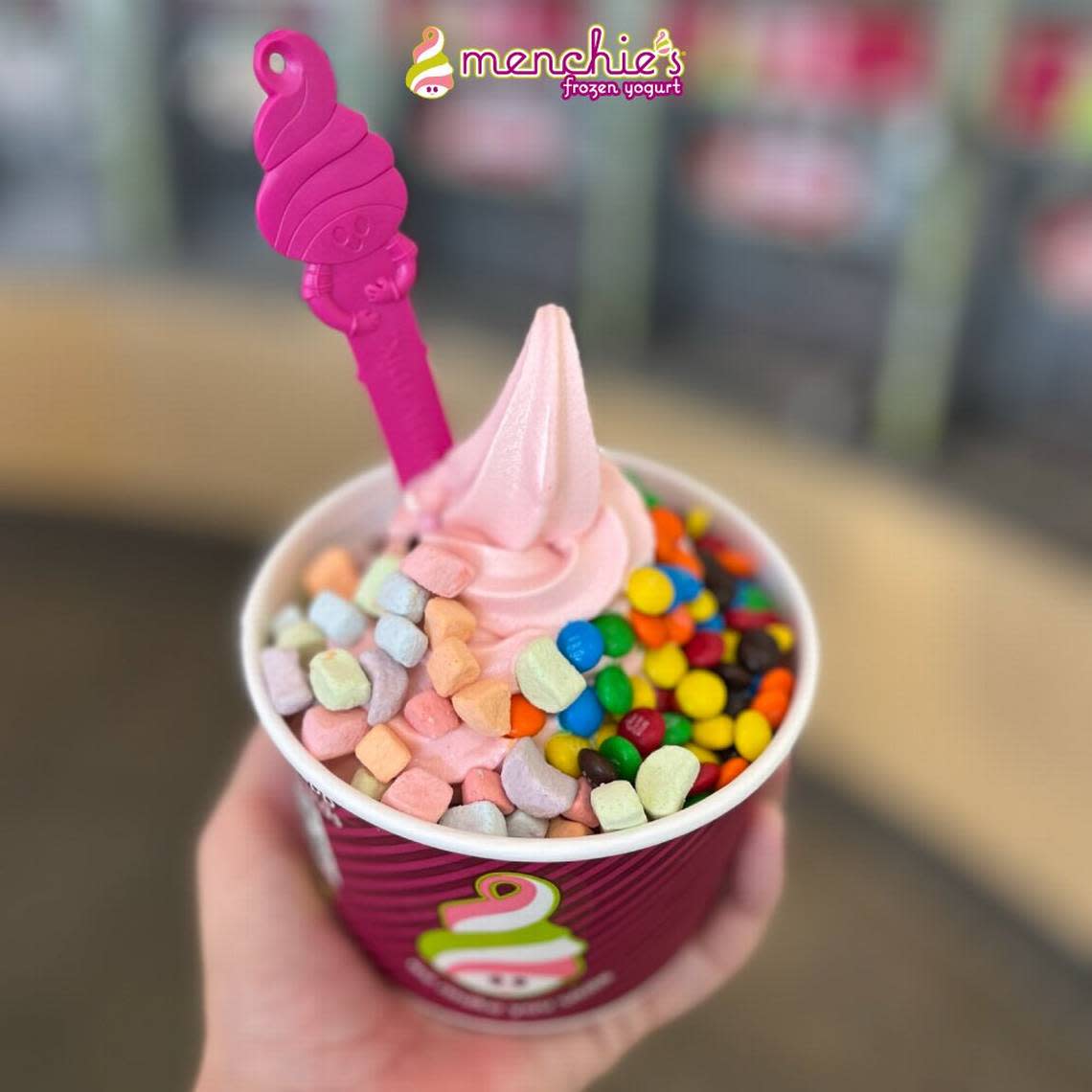 Menchie’s Frozen Yogurt offers customers a variety of toppings.