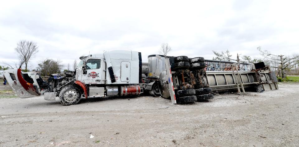 A truck trailer can be seen against a tailer truck Saturday, April 1, 2023. The trailer was picked up and thrown against the trailer truck by a tornado that hit Sherman Friday evening.