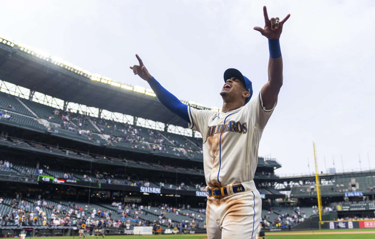 Seattle Mariners' Julio Rodriguez celebrates after the team's 6-1 win in a baseball game against the San Diego Padres, Wednesday, Sept. 14, 2022, in Seattle. (AP Photo/Stephen Brashear)