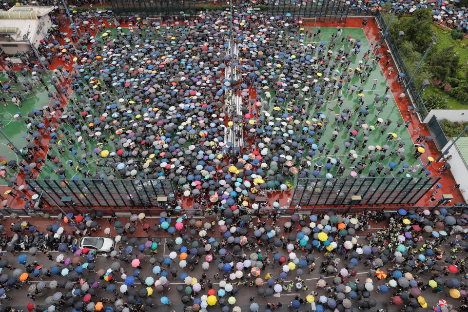 Pro-democracy protesters gather for a march in Hong Kong Saturday, Aug. 17, 2019. Another weekend of protests is underway in Hong Kong as Mainland Chinese police are holding drills in nearby Shenzhen, prompting speculation they could be sent in to suppress the protests. (AP Photo/Kin Cheung)