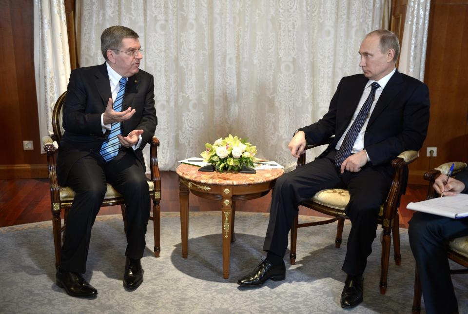 Russian President Vladimir Putin, right, meets with International Olympic Committee President Thomas Bach ahead of the upcoming 2014 Winter Olympics in Sochi, Russia, Tuesday, Feb. 4, 2014. (AP Photo/RIA-Novosti, Alexei Nikolsky, Presidential Press Service)