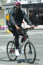 <p>LeBron James goes for a bike ride in West Hollywood in an all-black outfit on Saturday.</p>