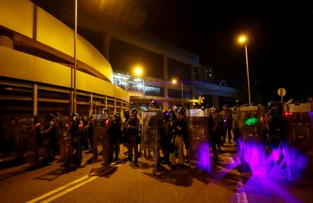 Protest at Yuen Long MTR station, the scene of an attack by suspected triad gang members a month ago