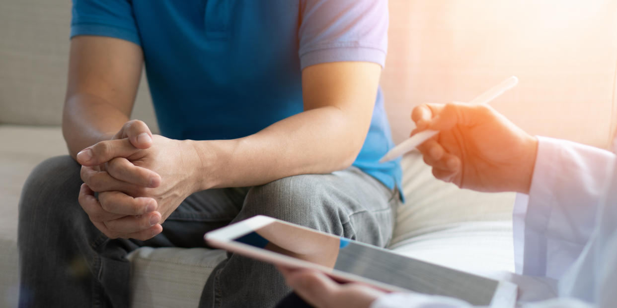 Men's health disease, on prostate cancer or mental illness concept with male patient having consultation with doctor or psychiatrist working on diagnostic examination in medical clinic or hospital. (Getty Images)