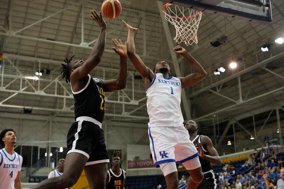 Jul 15, 2023; Toronto, Ontario, Canada; BAL Selects-Africa center Nelly Joseph (24) and USA-Kentucky guard Justin Edwards (1) go after a rebound during the first half at Mattamy Athletic Centre. Mandatory Credit: John E. Sokolowski-USA TODAY Sports