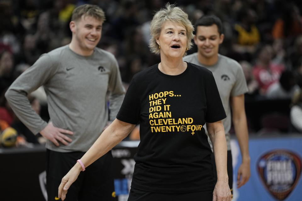 Iowa head coach Lisa Bluder smiles during practice for the NCAA Women's Final Four championship basketball game Saturday, April 6, 2024, in Cleveland. (AP Photo/Morry Gash)