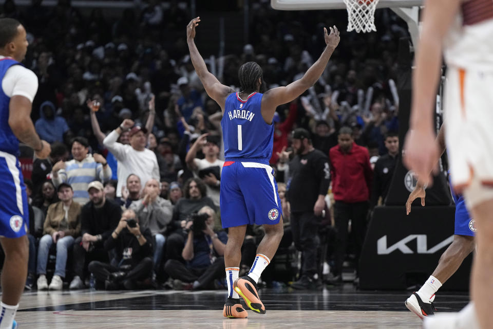 Los Angeles Clippers guard James Harden celebrates in the closing seconds of an NBA basketball game against the Phoenix Suns Monday, Jan. 8, 2024, in Los Angeles. (AP Photo/Mark J. Terrill)