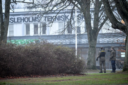 Police is seen outside Hassleholm Technical School after an explosion, in Hasselholm, Sweden December 20, 2018. TT News Agency/Johan Nilsson via REUTERS ATTENTION EDITORS - THIS IMAGE WAS PROVIDED BY A THIRD PARTY. SWEDEN OUT. NO COMMERCIAL OR EDITORIAL SALES IN SWEDEN.