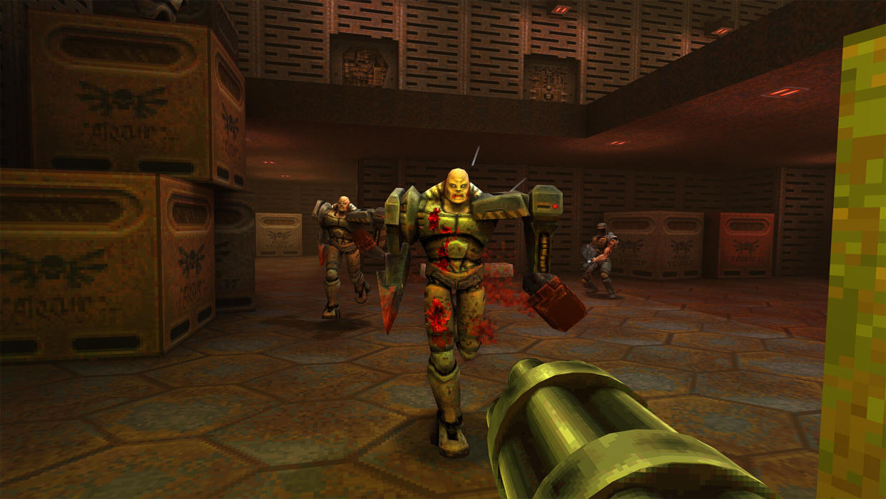  Fighting enemies using a minigun in Quake 2. . 