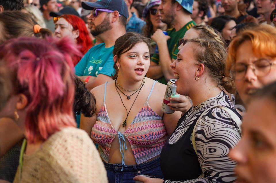 People dance as Japanese Breakfast performs on the Hy-Vee Main Stage during the 80/35 Music Festival Friday, July 8, 2022 in downtown Des Moines