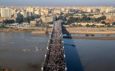 An aerial view shows mourners at the funeral procession for Gen Qassem Soleimani in Ahvaz - Credit: Morteza Jaberian/&nbsp;Mehr News Agency