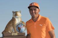 December 3, 2017; New Providence, The Bahamas; Rickie Fowler poses with the trophy after the final round of the Hero World Challenge golf tournament at Albany. Mandatory Credit: Kyle Terada-USA TODAY Sports