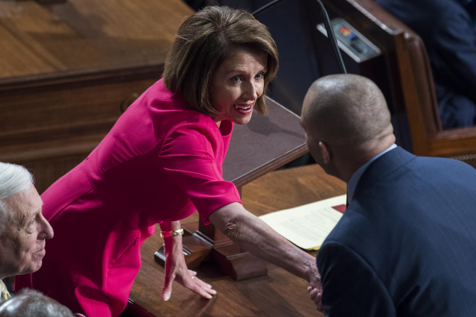 Speaker of the House Nancy Pelosi, D-Calif., talks with Rep. Hakeem Jeffries, D-N.Y., before she won the speakership in the Capitol's House chamber on the first day of the 116th Congress on January 3, 2019. (Tom Williams/CQ Roll Call via Getty Images)