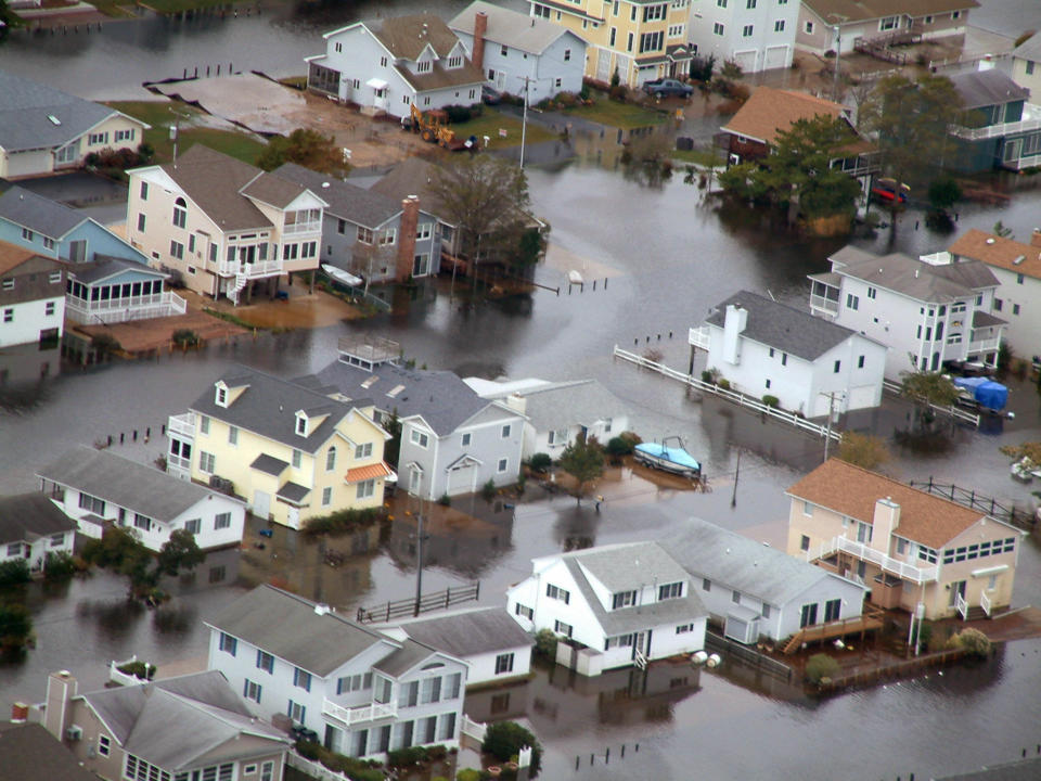 Homes in Bethany Beach, Del. are surrounded by floodwaters from superstorm Sandy on Tuesday, Oct. 30, 2012. Officials said Bethany and nearby Fenwick Island appeared to be among the hardest-hit parts of the state. (AP Photo/Randall Chase)