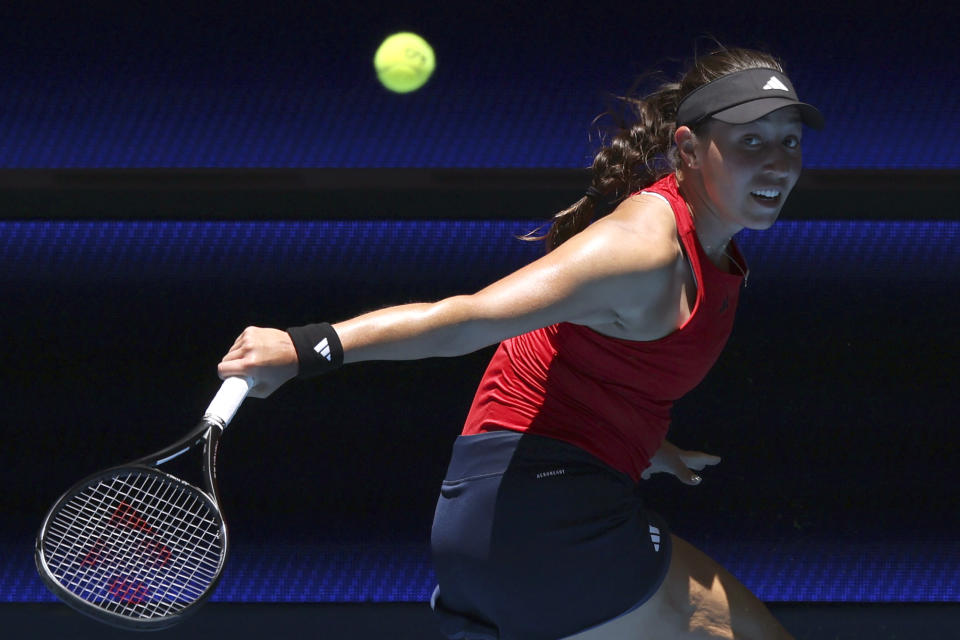 Jessica Pegula of the United States plays a shot from Katie Boulter of Britain during the United Cup tennis tournament in Perth, Australia, Sunday, Dec. 31, 2023. (AP Photo/Trevor Collens)