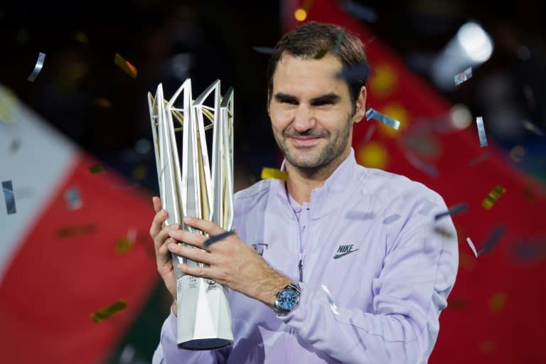 Roger Federer holds the trophy after winning a second Shanghai Masters crown -- and a sixth title in 2017