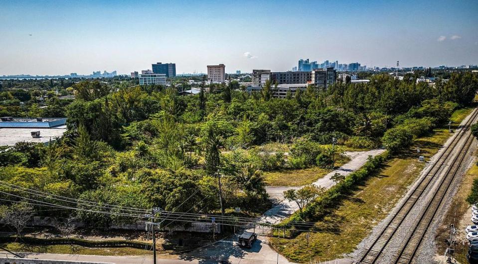 Aerial view of the empty lot where the Little Farm Mobile Court Trailer Park used to be located on NE 87th Street. It was slated to become part of a new residential and shopping complex.