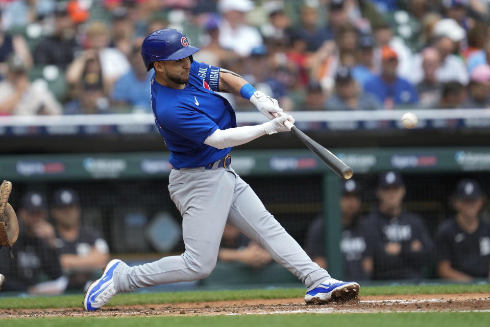 Chicago Cubs' Nick Madrigal hits a one-run single against the Detroit Tigers in the fourth inning of a baseball game, Wednesday, Aug. 23, 2023, in Detroit. (AP Photo/Paul Sancya)