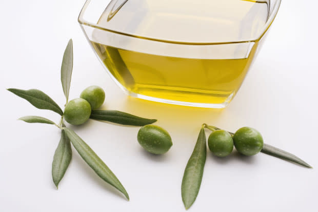 <p>This oil from the first pressing of olives contains mostly polyphenols and monounsaturated fat, which are great for your heart. </p><p>According to new research in the American Heart Association’s journal <em>Circulation</em>, people who stuck with Mediterranean diets with four tablespoons of extra-virgin olive oil per day for a year had much better HDL function, meaning better plaque removal and more relaxed blood vessels. This diet went against a “healthy” control group that focused on reducing red meat, processed food, high-fat dairy, and sweets. </p><p>To get better HDL function, drizzle extra-virgin olive oil <a href="http://www.michelledudash.com/2014/04/22/warm-mushroom-and-spinach-salad-with-shrimp/" rel="nofollow noopener" target="_blank" data-ylk="slk:over salads;elm:context_link;itc:0;sec:content-canvas" class="link ">over salads</a> and hard-boiled eggs. Cook with it on low or medium heat.</p>