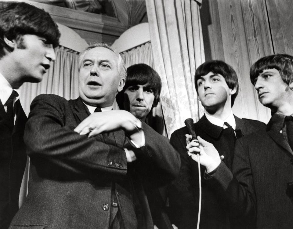 A picture taken by Mr O'Neill of the Beatles with Prime Minister Harold Wilson in 1964 (Terry O'Neill / Iconic Images)