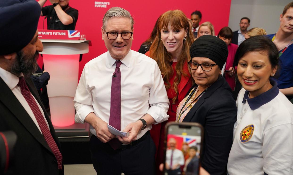 <span>Keir Starmer and Angela Rayner, centre, at Labour’s campaign launch in Dudley on Thursday.</span><span>Photograph: Jordan Pettitt/PA</span>