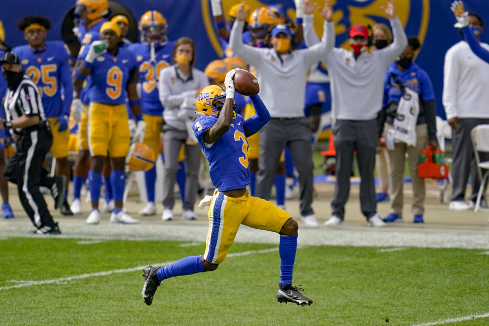 Pittsburgh Panthers wide receiver Jordan Addison (3) makes a catch of a Kenny Pickett pass before turning and running it for a touchdown during the first half of an NCAA college football game against North Carolina State, Saturday, Oct. 3, 2020, in Pittsburgh. (AP Photo/Keith Srakocic)