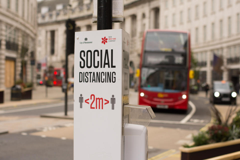 LONDON, UNITED KINGDOM - 2021/02/22: A social distance sign in Regent Street amid covid-19 pandemic. (Photo by Pietro Recchia/SOPA Images/LightRocket via Getty Images)