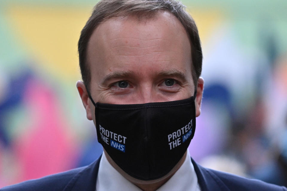 LONDON, ENGLAND - OCTOBER 27: Britain's Health Secretary Matt Hancock wearing a face mask during a visit with Britain's Camilla, Duchess of Cornwall (unseen) to watch a demonstration by the charity Medical Detection Dogs, which trains dogs to detect the odour of human disease at Paddington Station on October 27, 2020 in London, England. (Photo by Justin Tallis - WPA Pool/Getty Images)