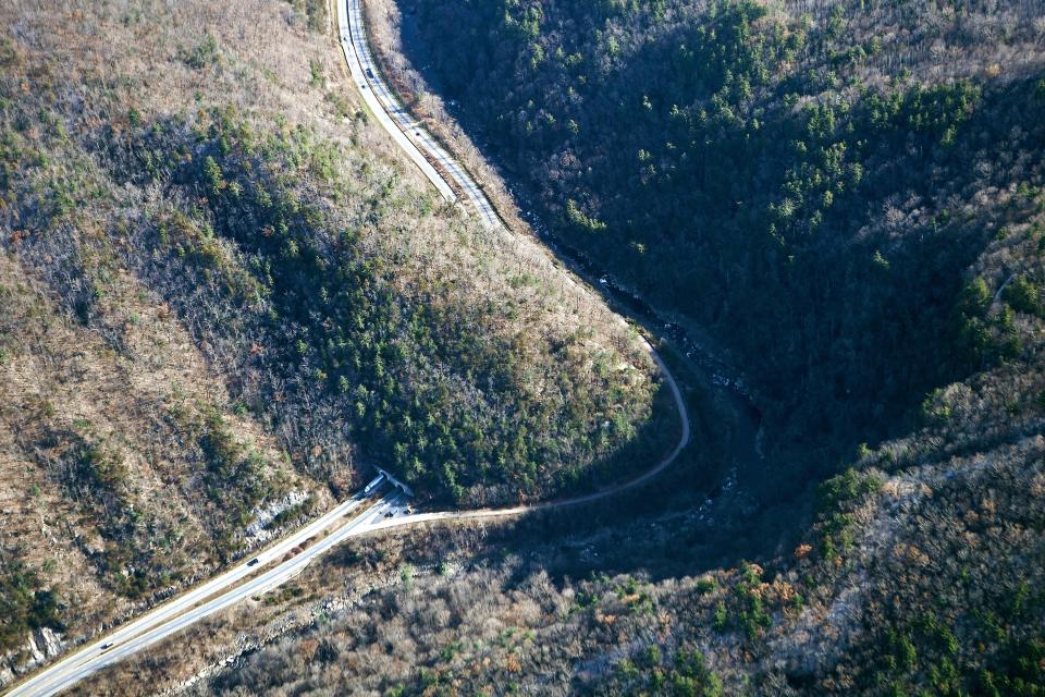 This aerial view of Interstate 40 shows the study area where Travis Wilson has been working in the Smokies lately as part of Safe Passage: The I-40 Pigeon River Gorge Wildlife Crossing Project. Photo made possible by Jake Faber and SouthWings.