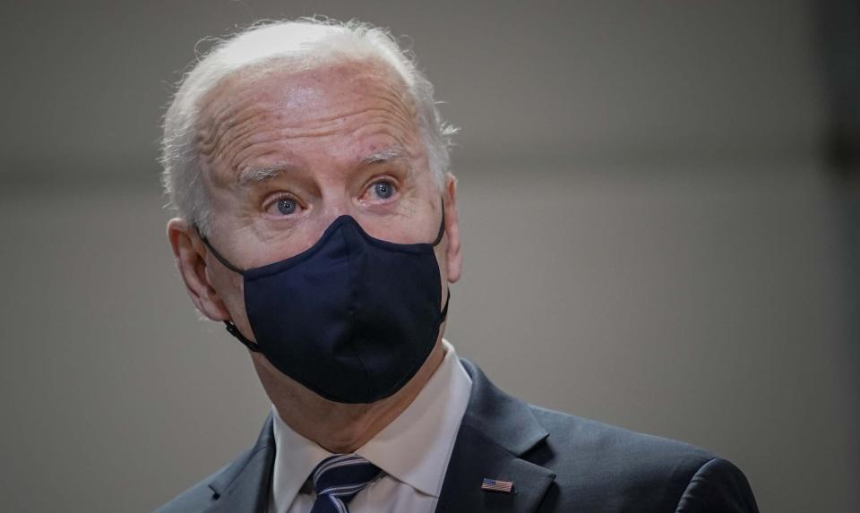 President Joe Biden looks on during his visit to Smith Flooring, Inc., Tuesday March 16, 2021, in Chester, Pa. President Biden says New York Gov. Andrew Cuomo should resign if the state attorney general's investigation confirms the sexual harassment allegations against him. (AP Photo/Carolyn Kaster)