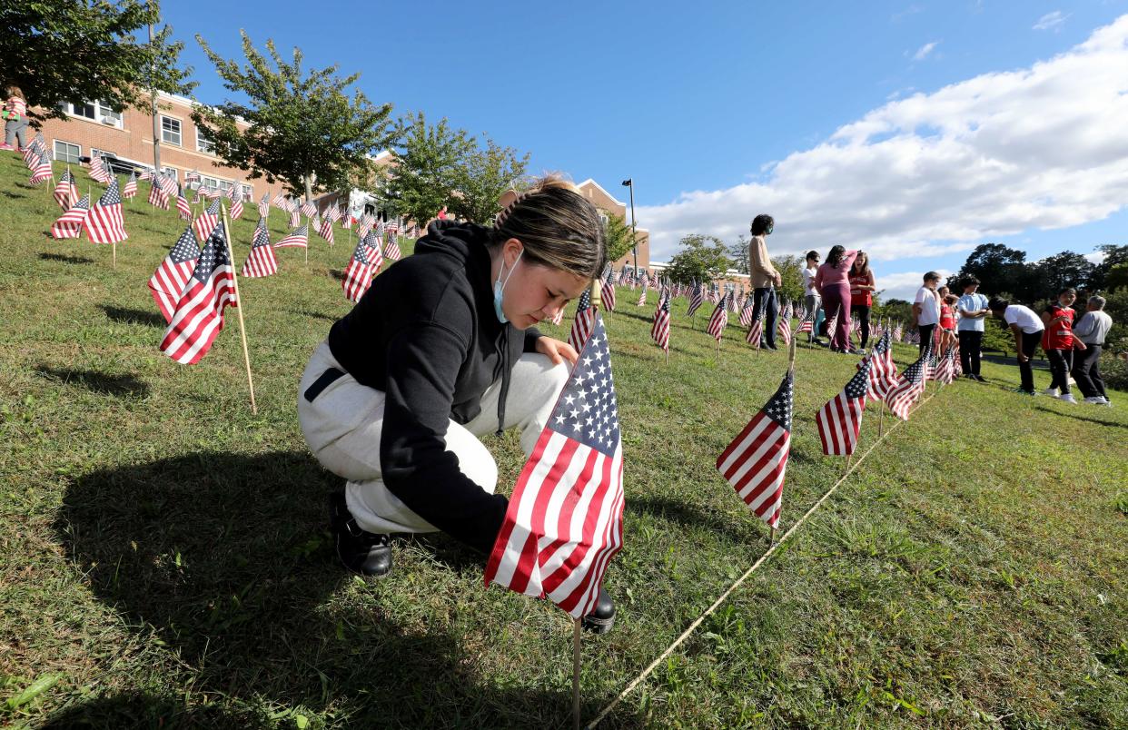 American flags are planted in front of Sleepy Hollow Middle School each Veteran's Day and Memorial Day.