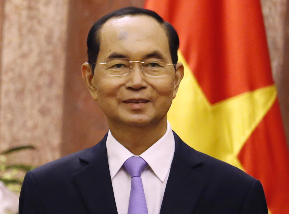 FILE - In this Sept. 13, 2018, file photo, Vietnam's President Tran Dai Quang meets with Myanmar's leader Aung San Suu Kyi at the Presidential Palace during the World Economic Forum on ASEAN in Hanoi, Vietnam. Official media say Vietnamese President Tran Dai Quang has died at age 61 due to illness on Friday, Sept. 21, 2018. (Kham/Pool Photo via AP, File)